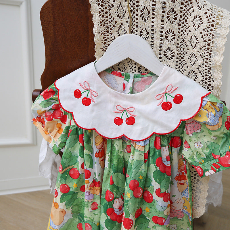 Vestido de verano con cuello bordado y mangas cortas con estampado de pintura al óleo de dibujos animados para niñas y niños de nuevo diseño 