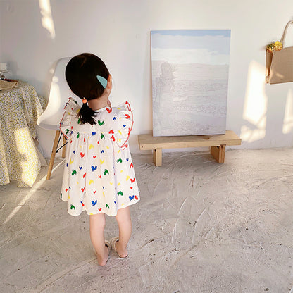 Vestido con mangas abullonadas y estampado de corazones de colores para niñas y bebés de verano más vendido 