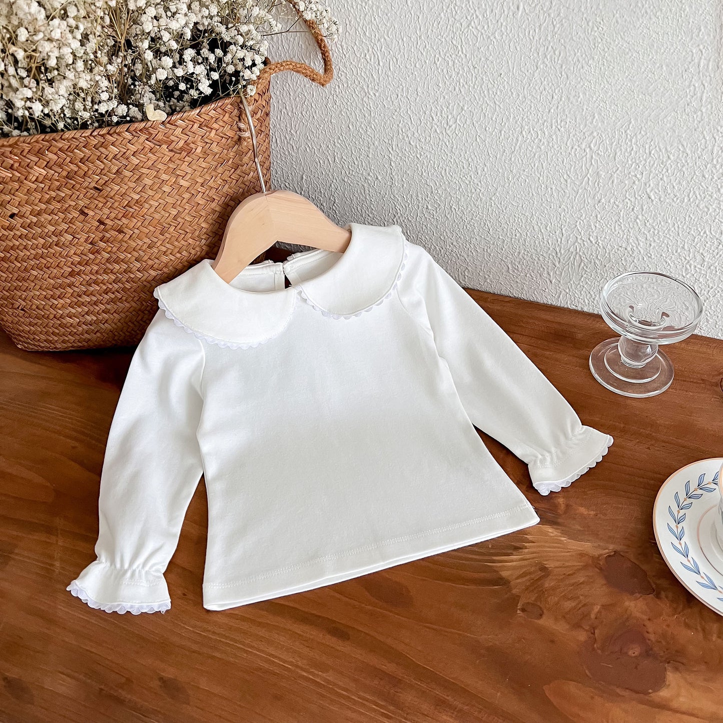 Nueva llegada de otoño para niñas, camisa blanca de color liso con cuello Peter Pan y mangas largas 